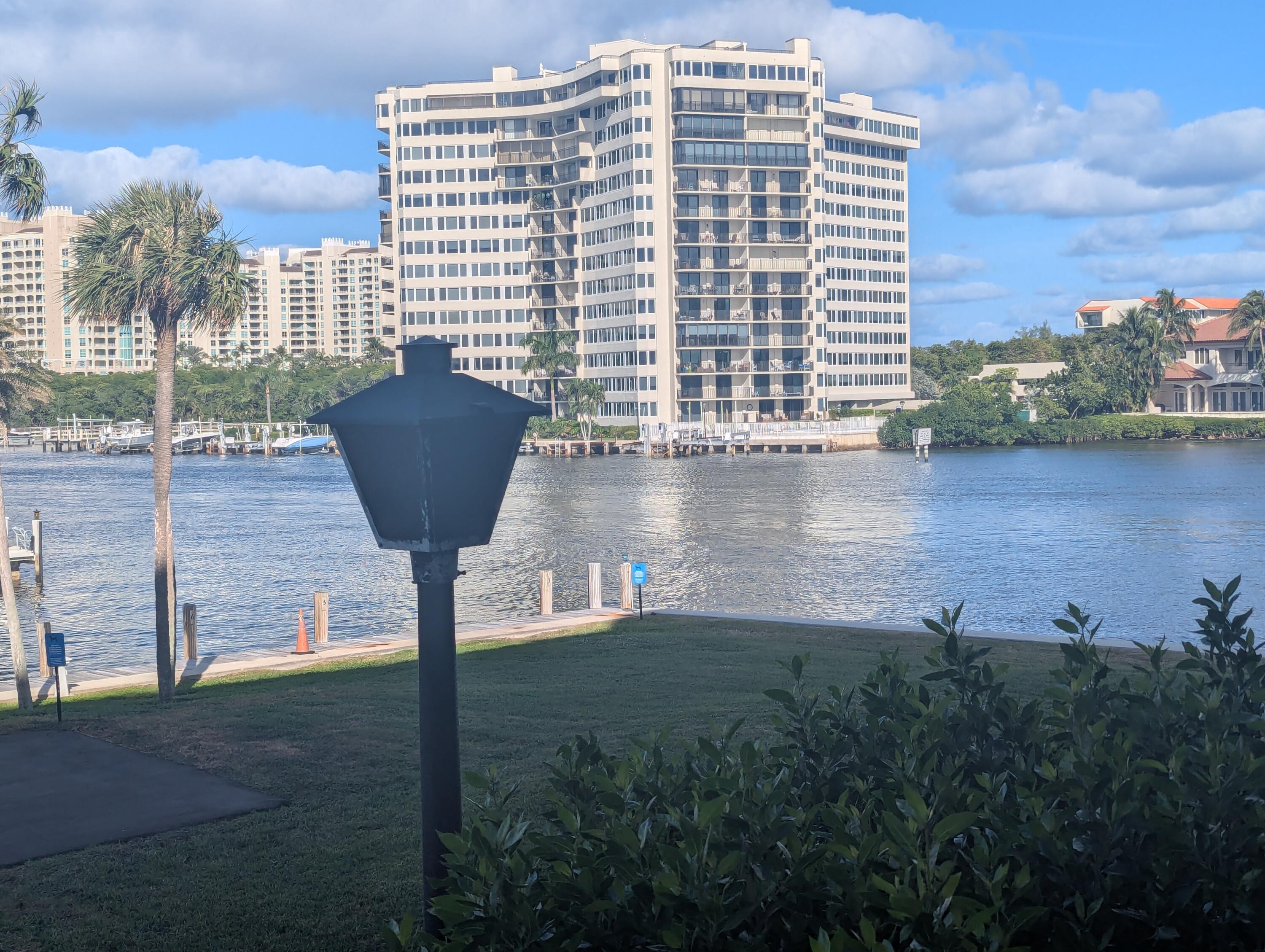 a view of a lake with a building in the background