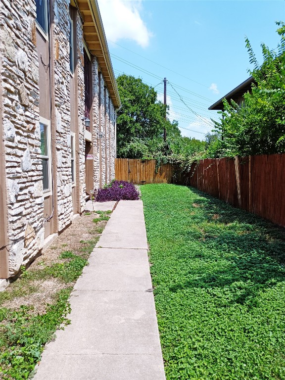 a front view of a house with yard