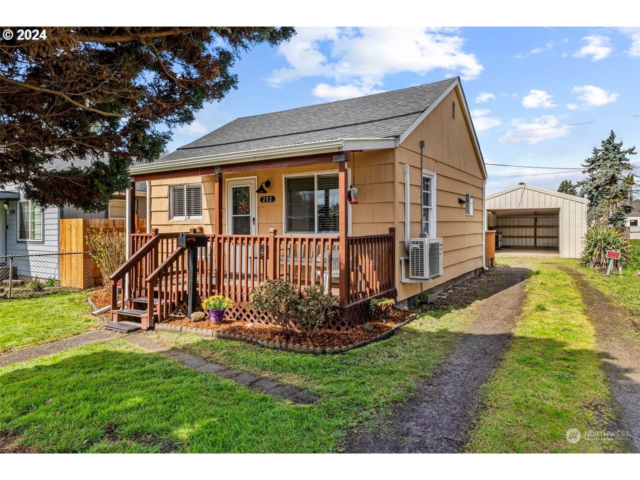 a view of a house with a yard