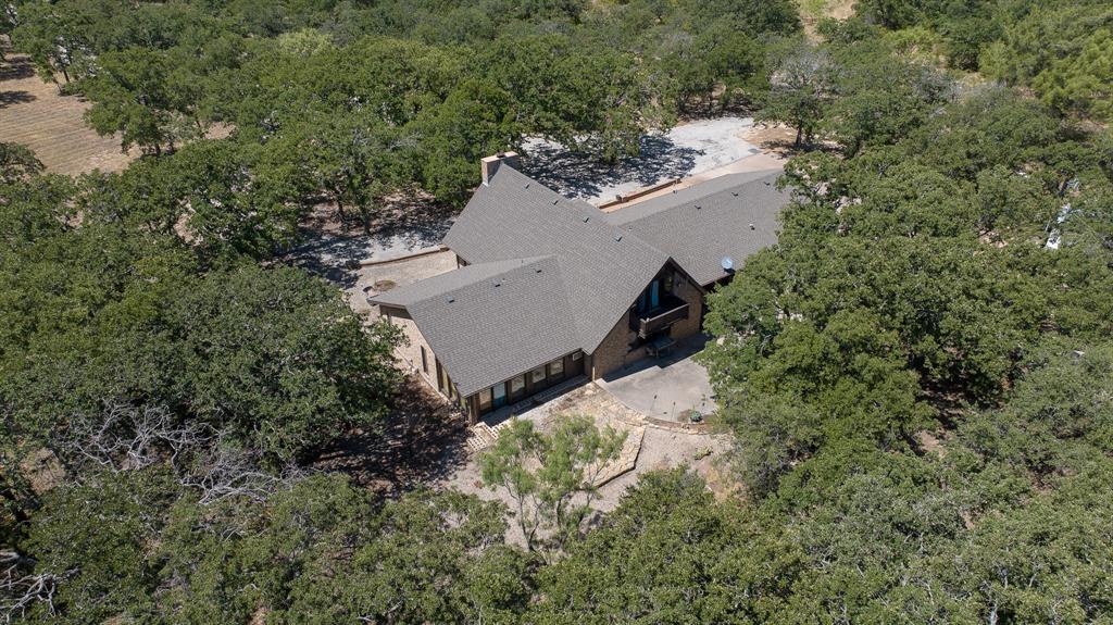 an aerial view of residential house with outdoor space