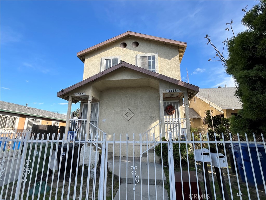 a front view of a house with yard