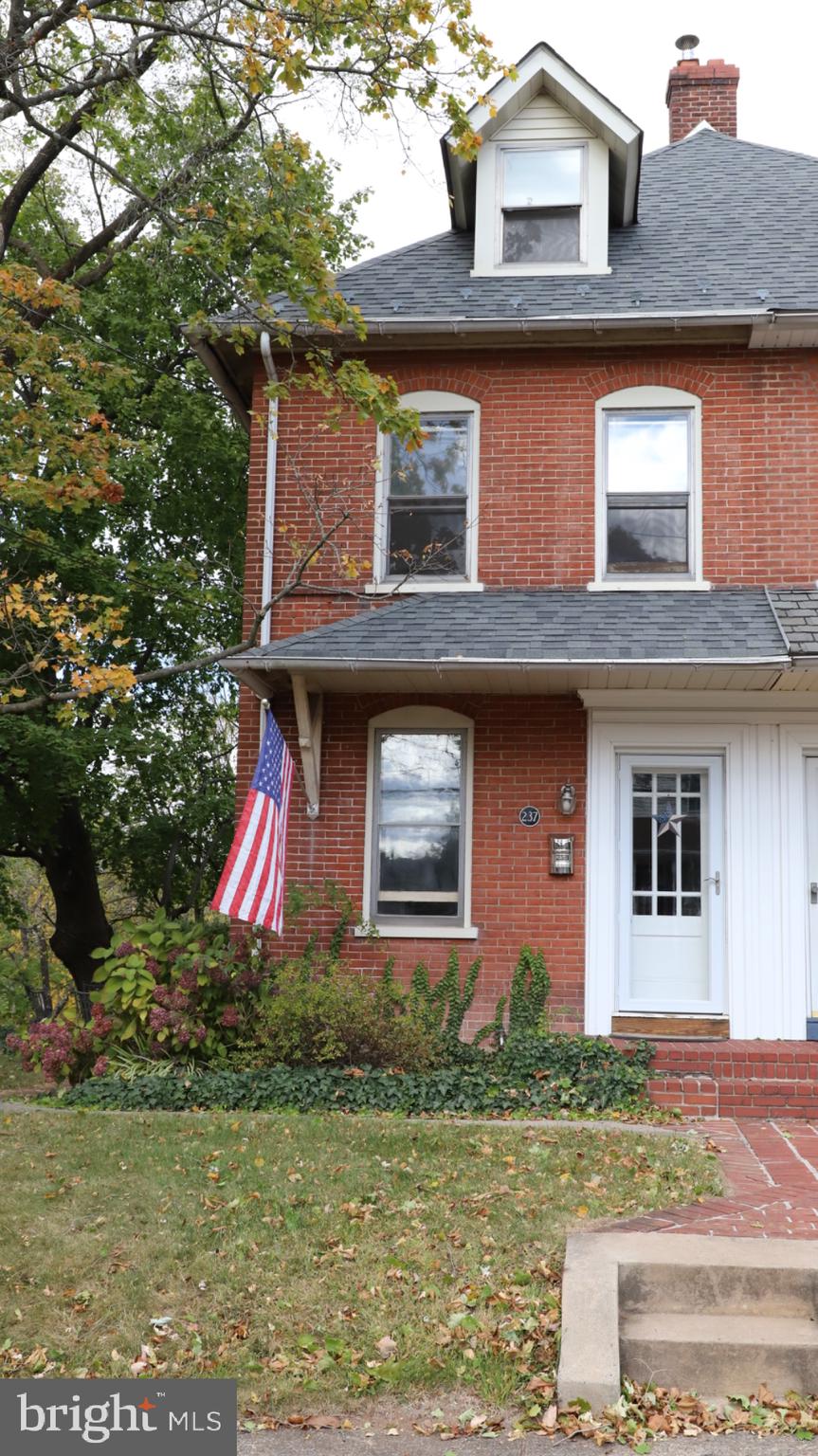 a front view of house with yard