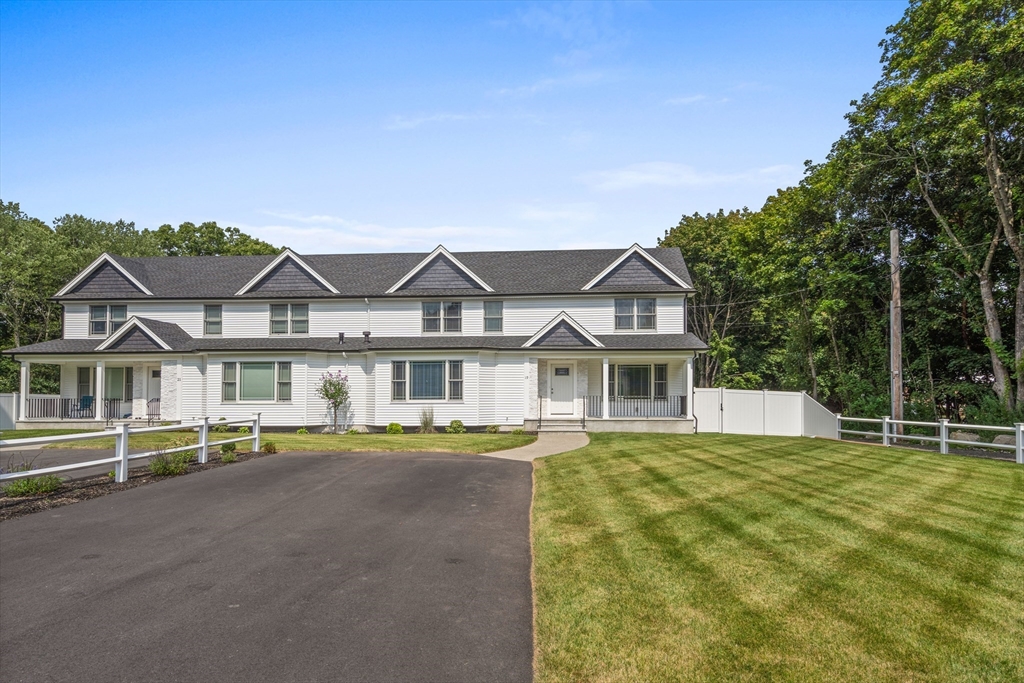 front view of a house with a patio