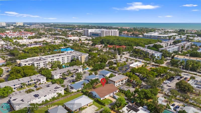 an aerial view of a city with lots of residential buildings