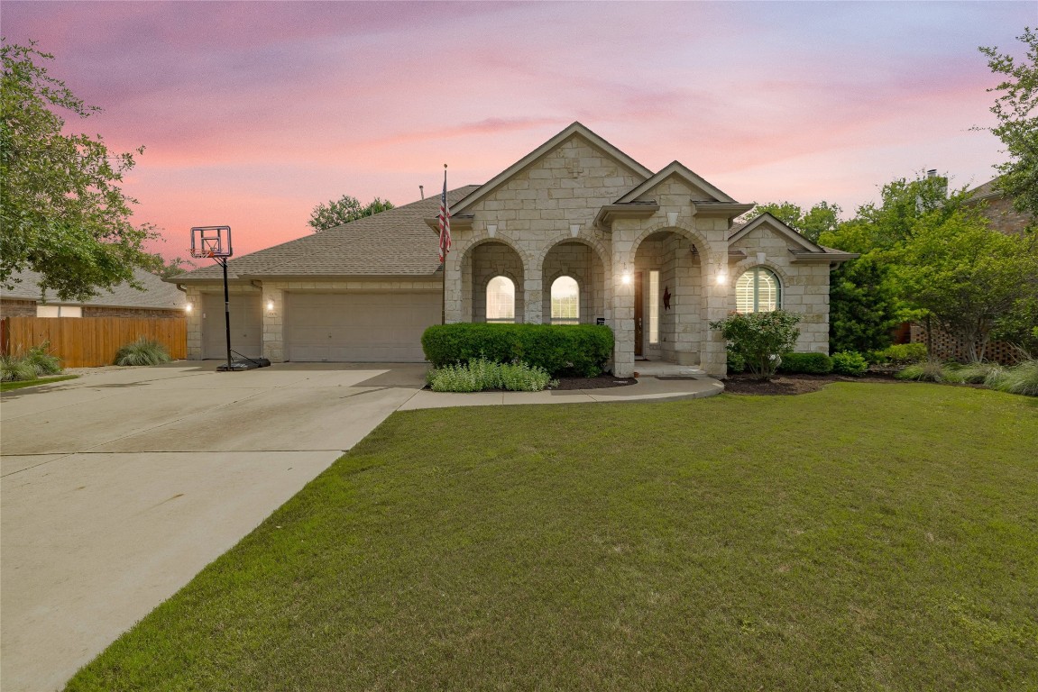 Gorgeous limestone exterior and a 3 car garage.