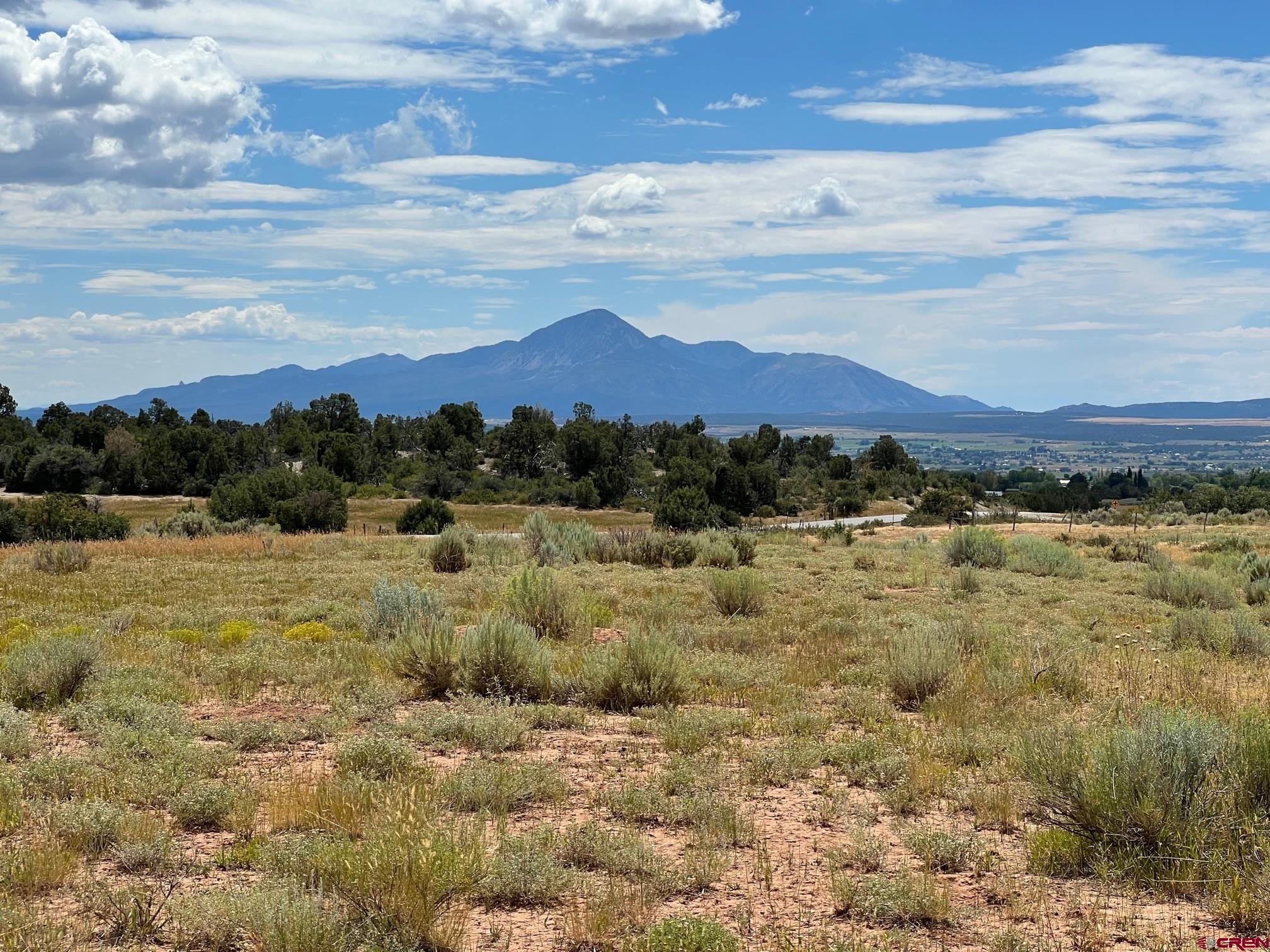 a view of a lake with mountains in the background