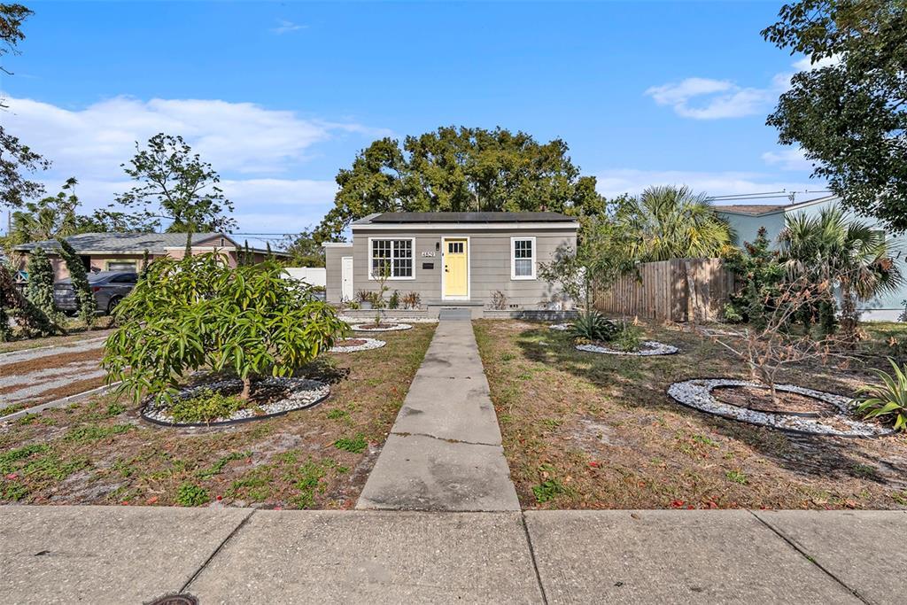 front view of a house with a yard