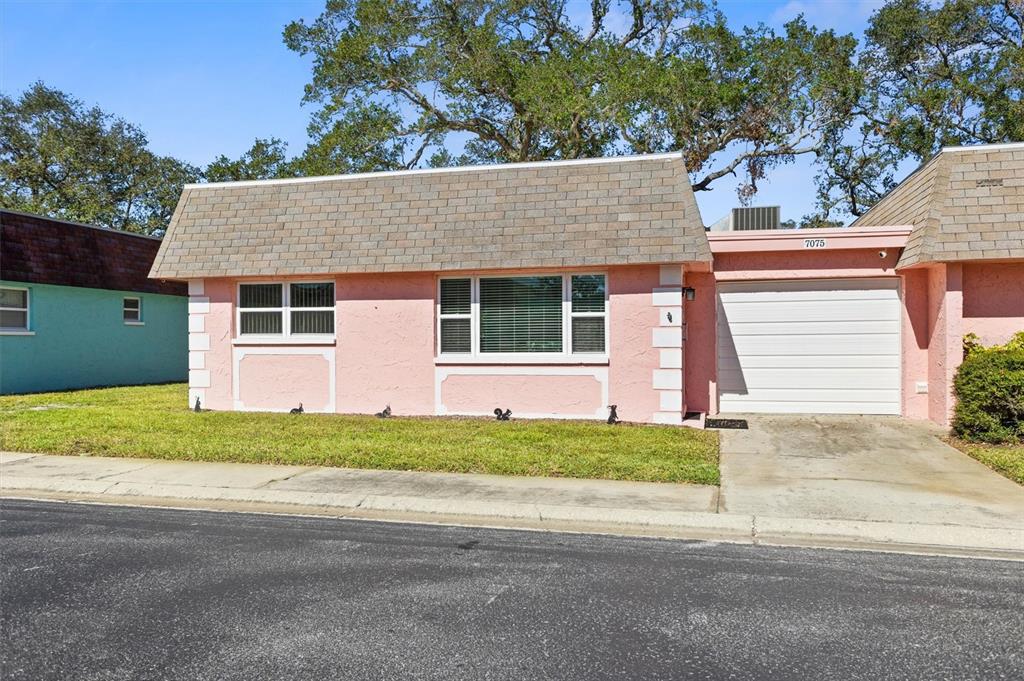 front view of a house and a yard