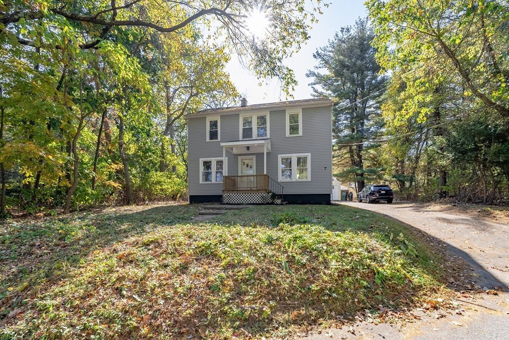 front view of a house with a yard