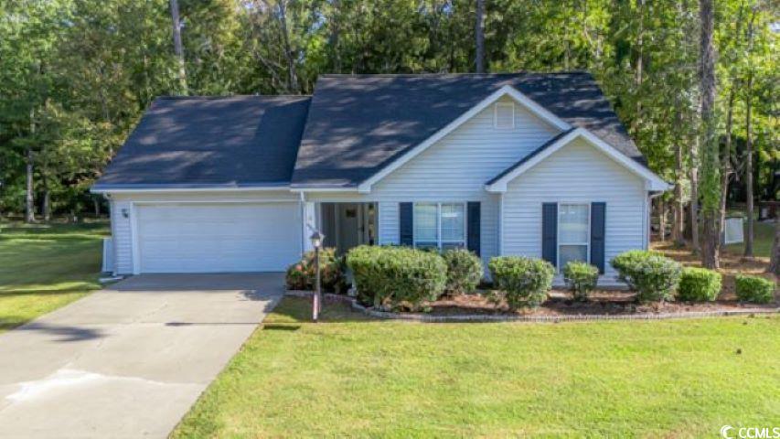 View of front of house featuring a front yard and