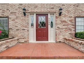 a view of outdoor space and front door