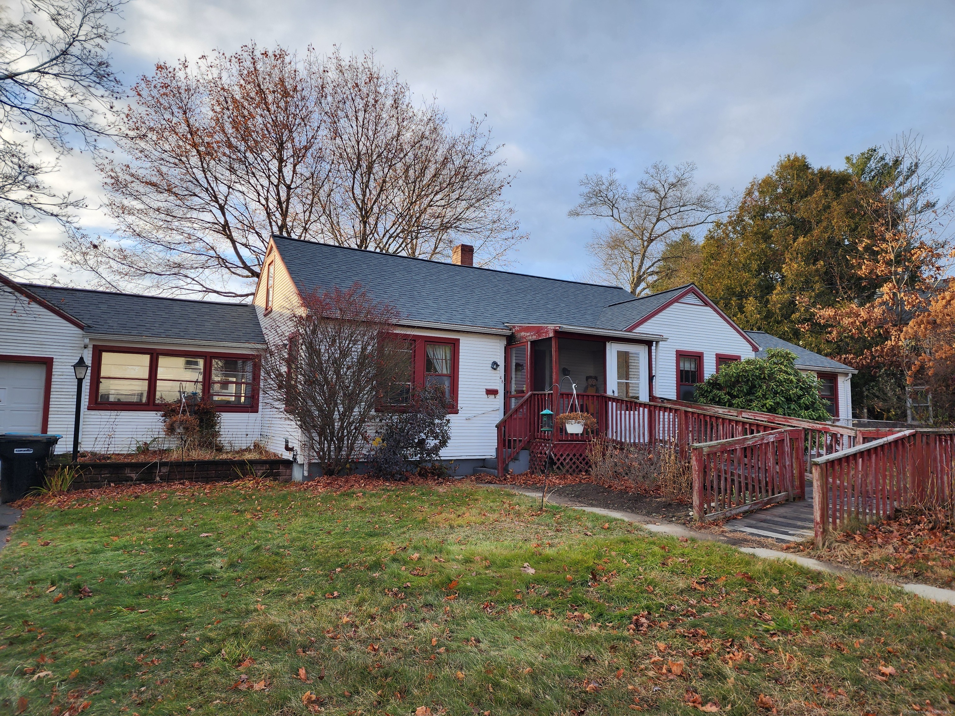 front view of a house with a yard