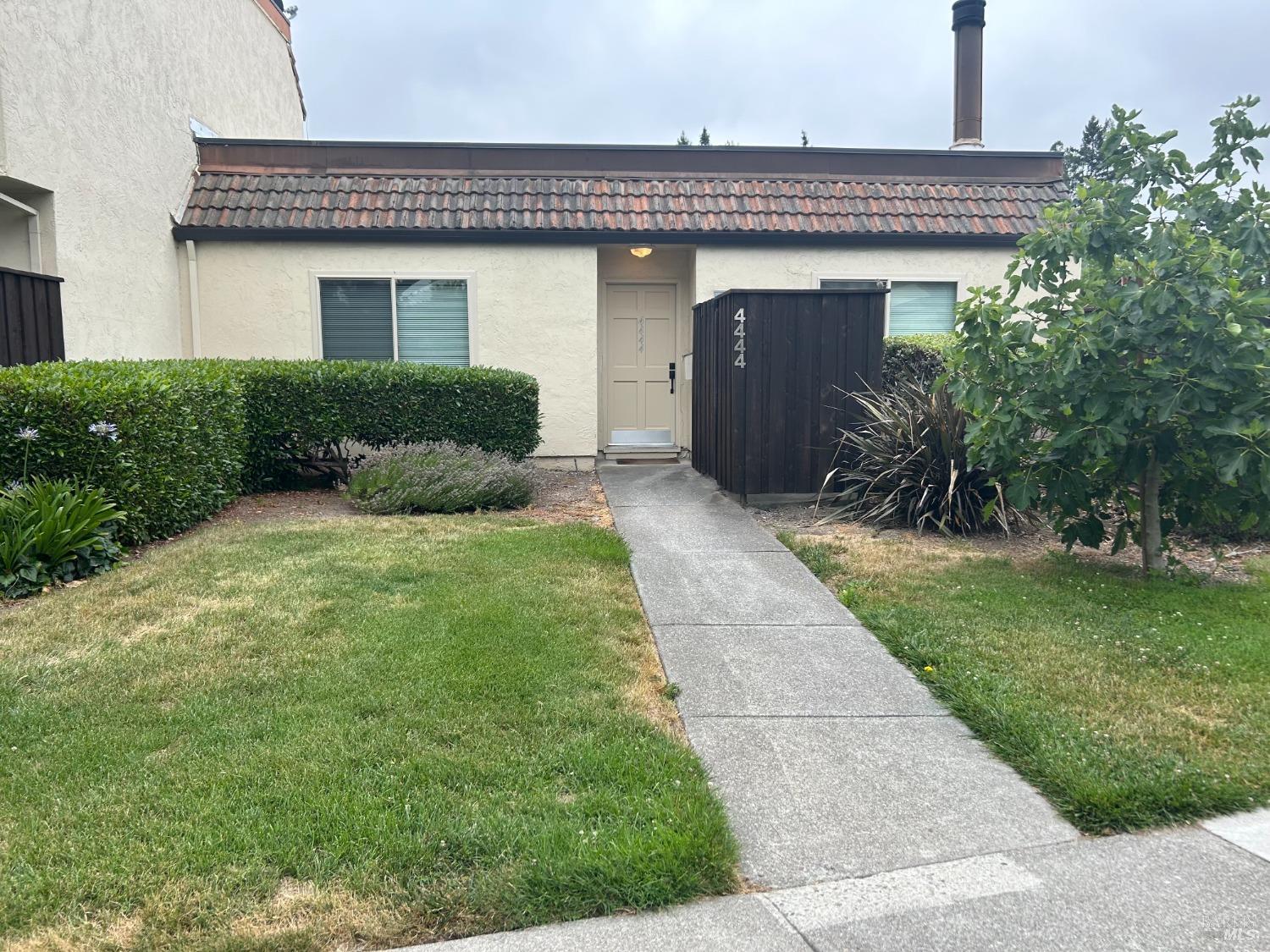 a front view of house with yard