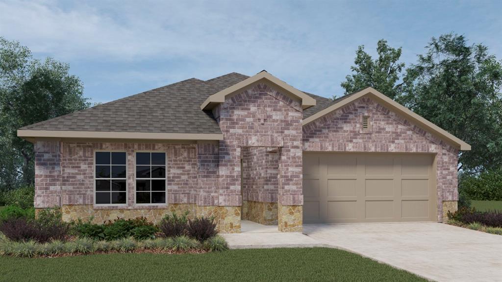 a front view of a house with a garden and garage