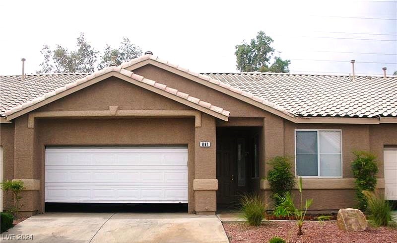 Single Level Townhome with 2 Car Attached Garage