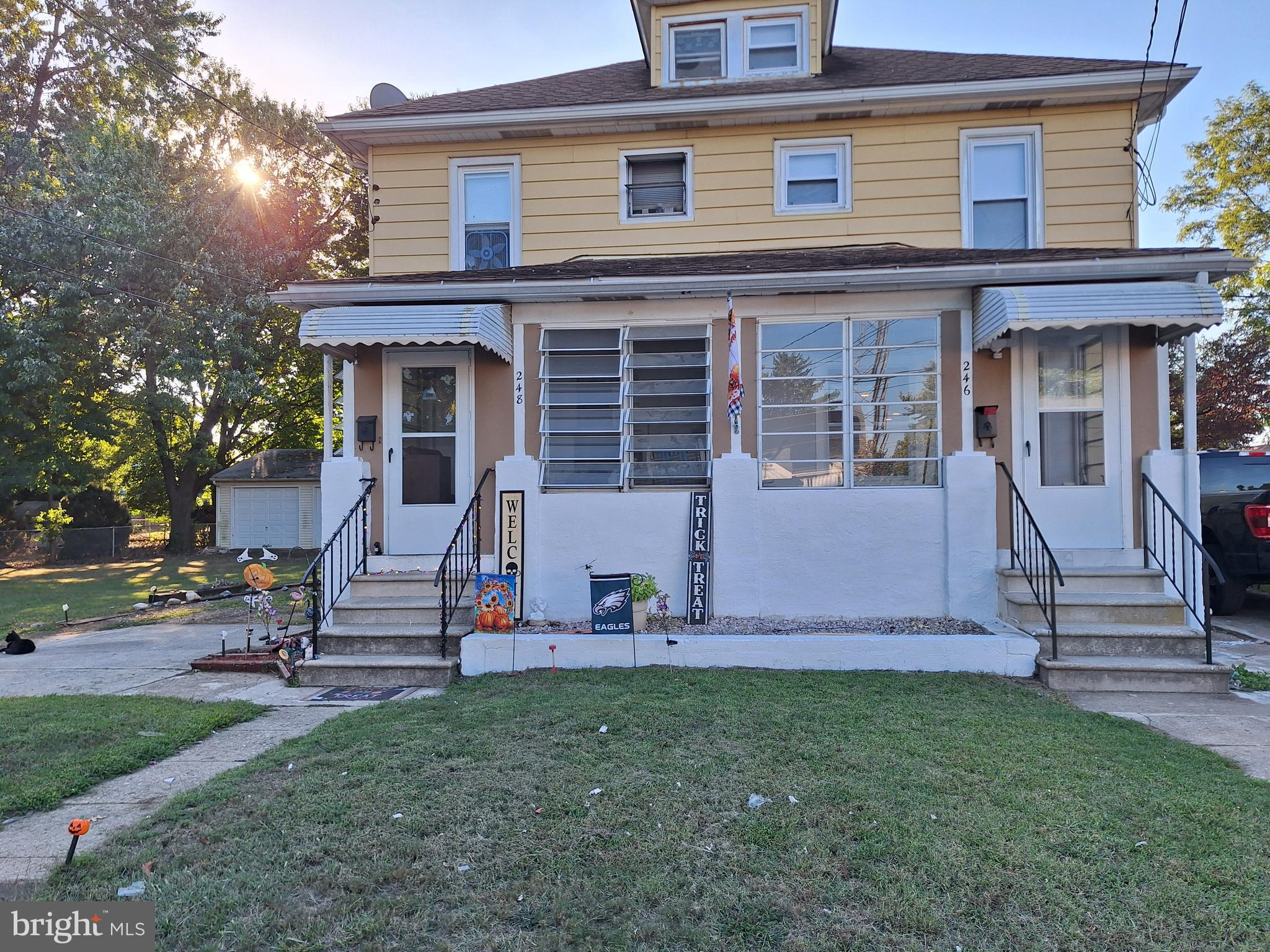 front view of a house with a yard