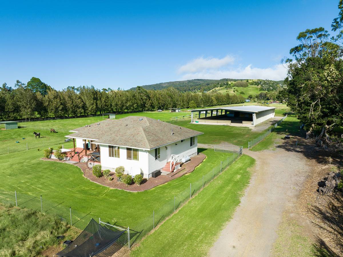 a view of a house with big yard