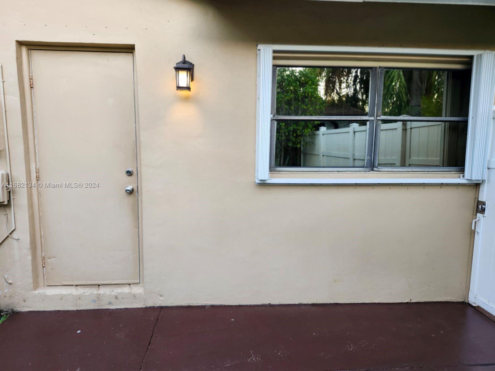 view of an empty room with a window