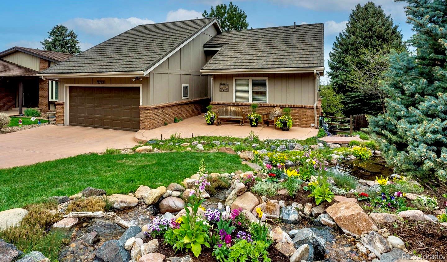 a house view with a garden space