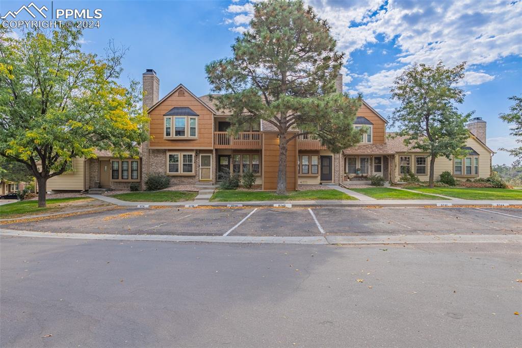 a house with trees in front of it