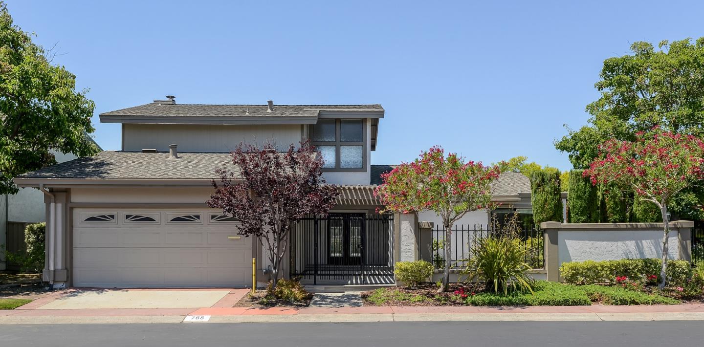 a house view with a outdoor space