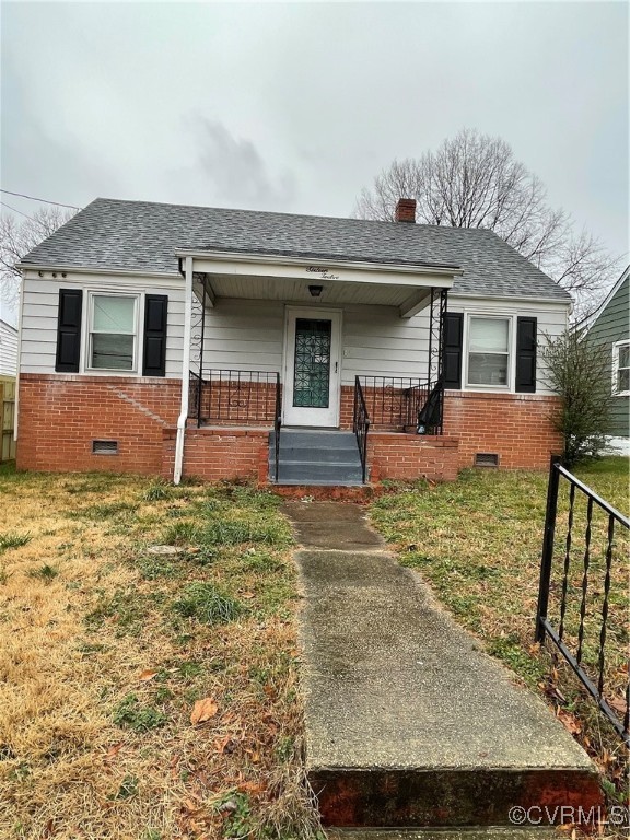 front view of a house with a yard