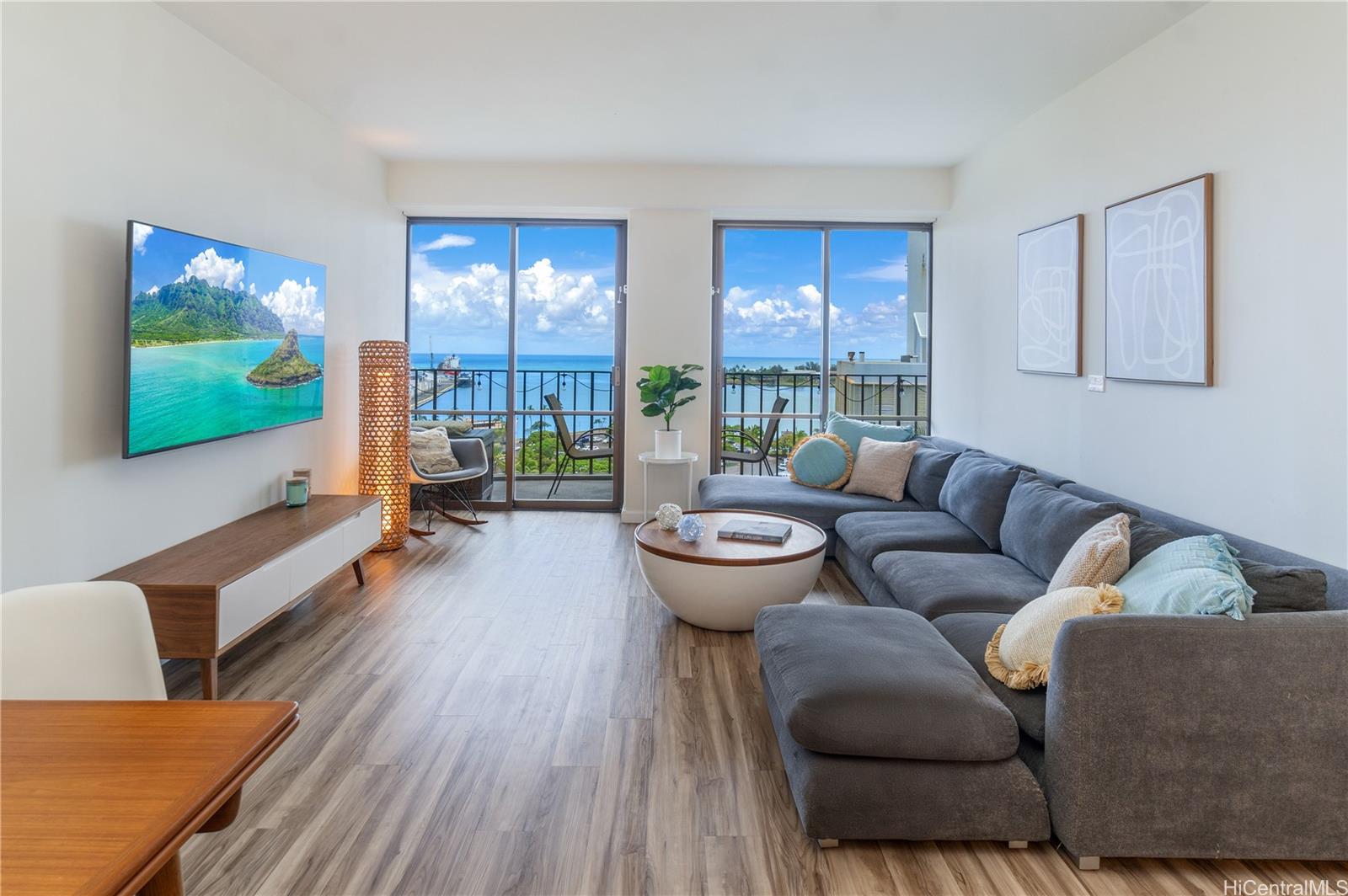 a living room with furniture and a flat screen tv