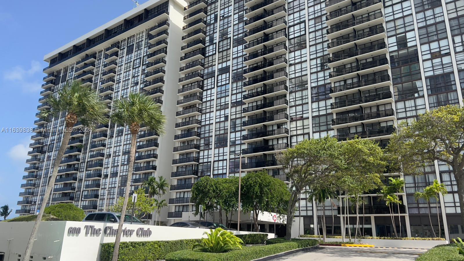 a view of a building with a garden