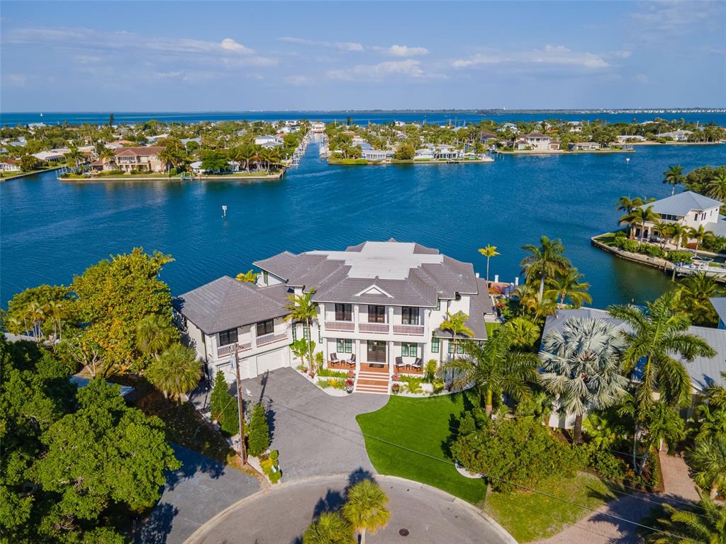 a view of a lake with a house in the background