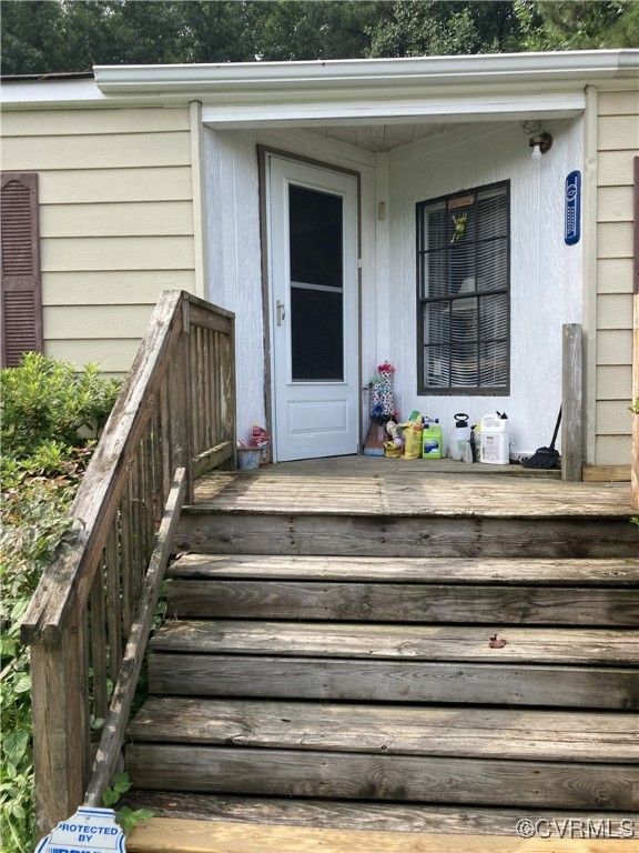 Entrance to property with a deck