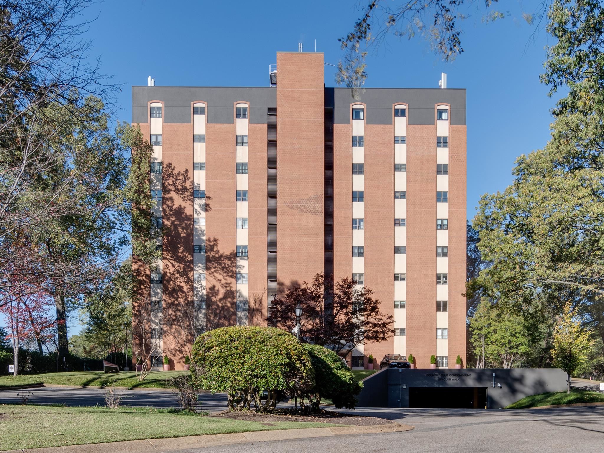 a front view of building with yard