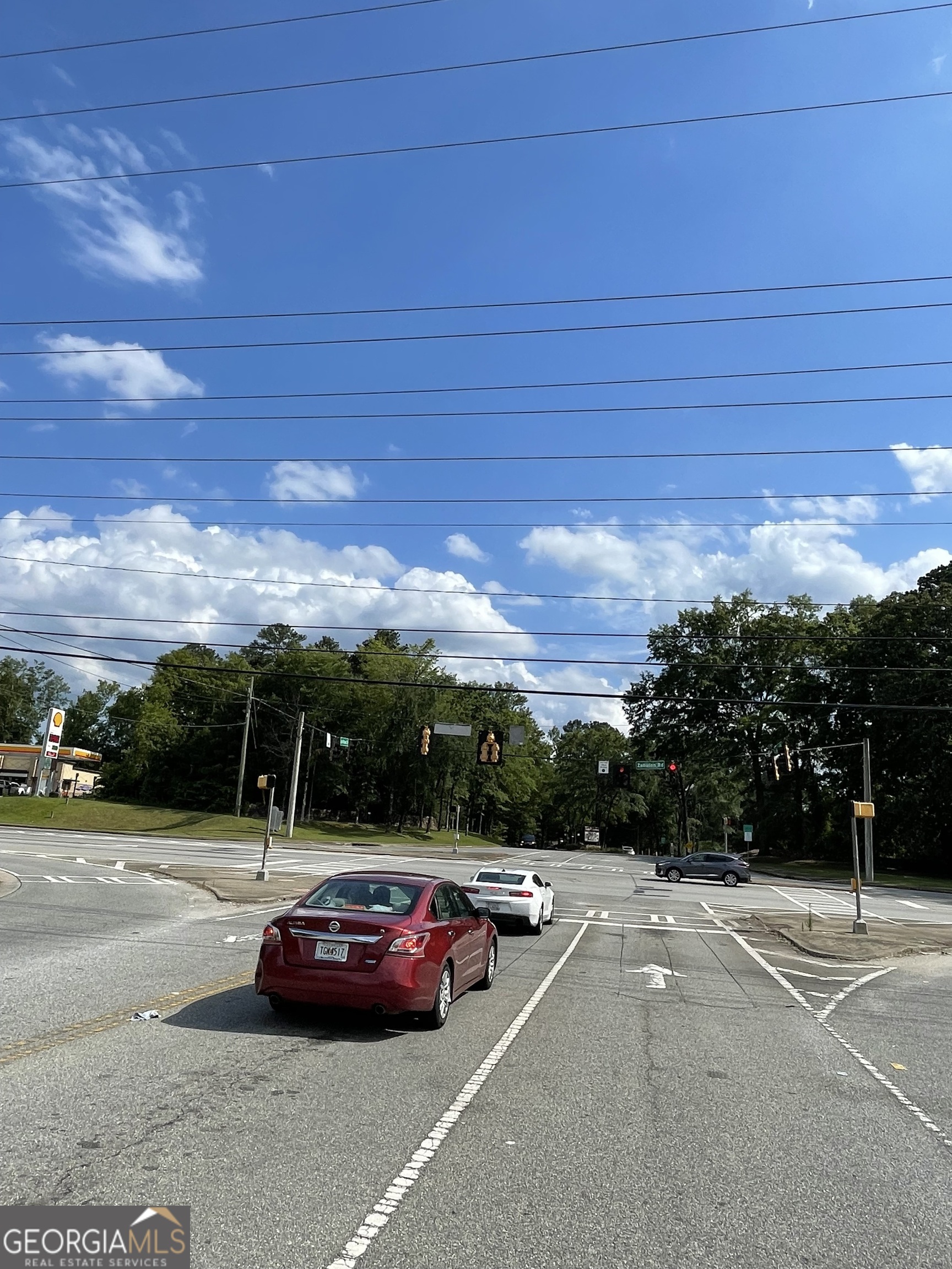 a view of street with cars