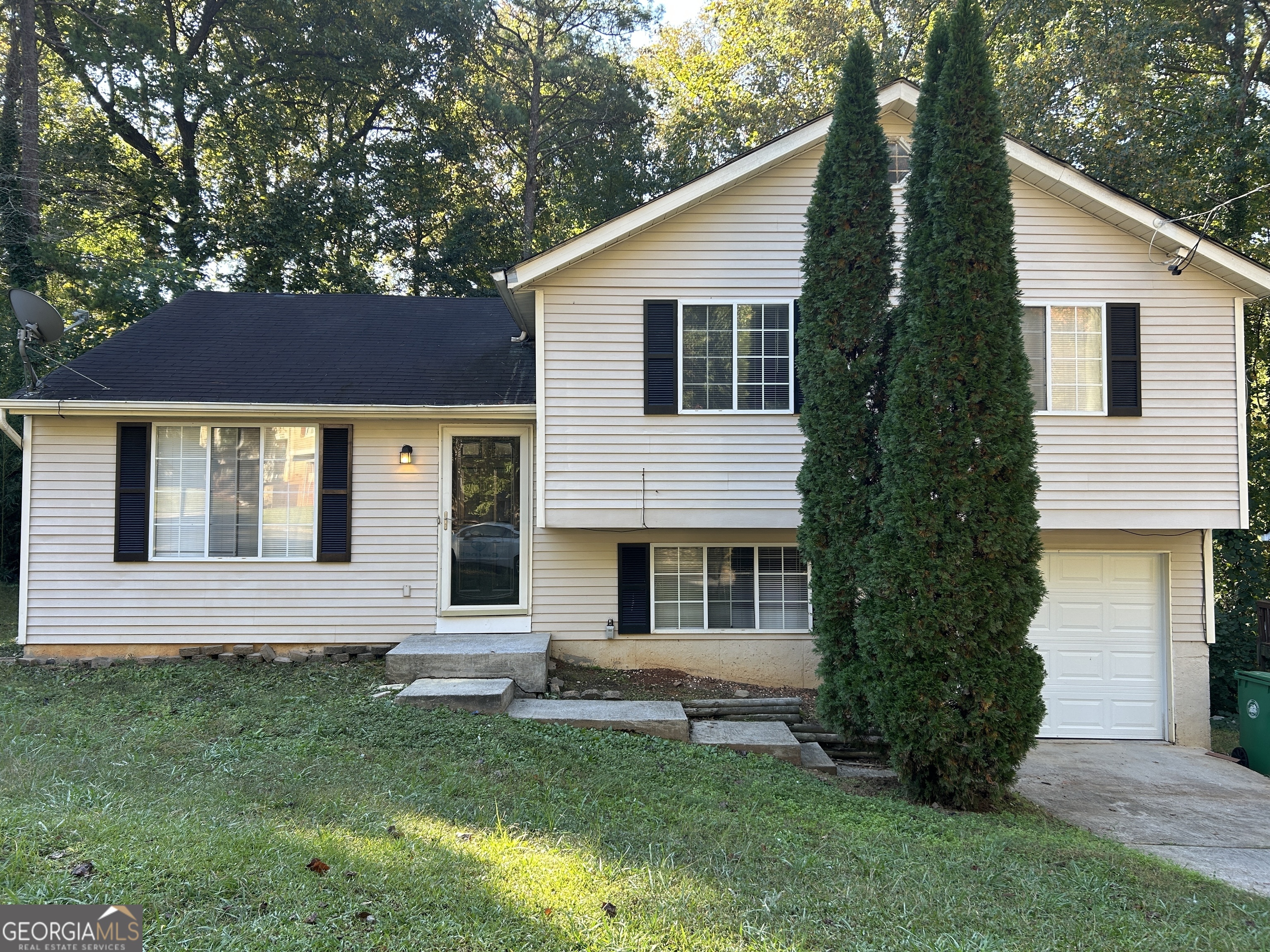 front view of a house with a yard