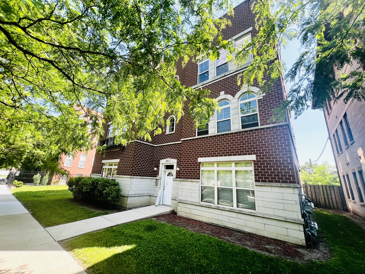 front view of a house with a yard