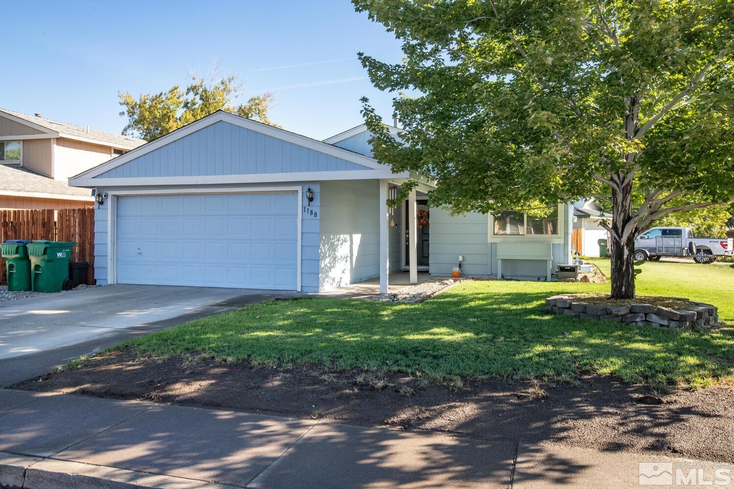 a front view of house with yard