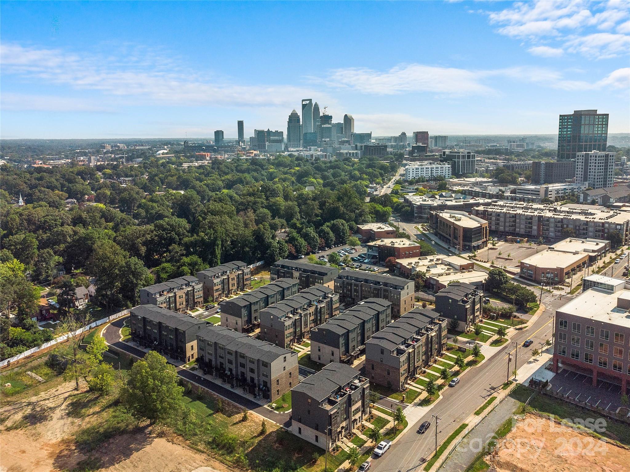 an aerial view of a city with lots of residential buildings