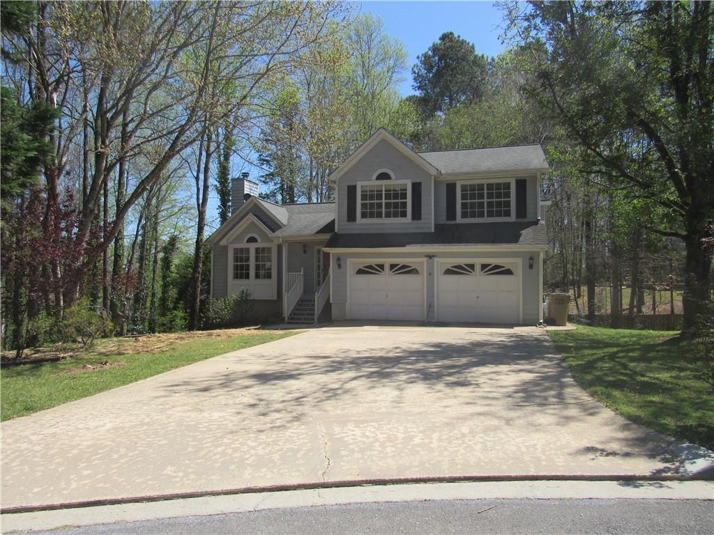 THIS HOME SITS WELL ON LOVELY CUL-DE-SAC LOT