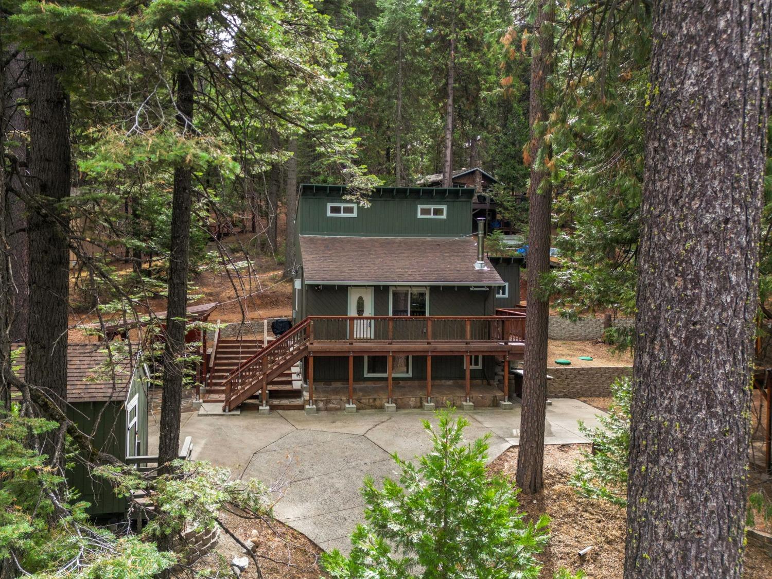 aerial view of a house with a yard