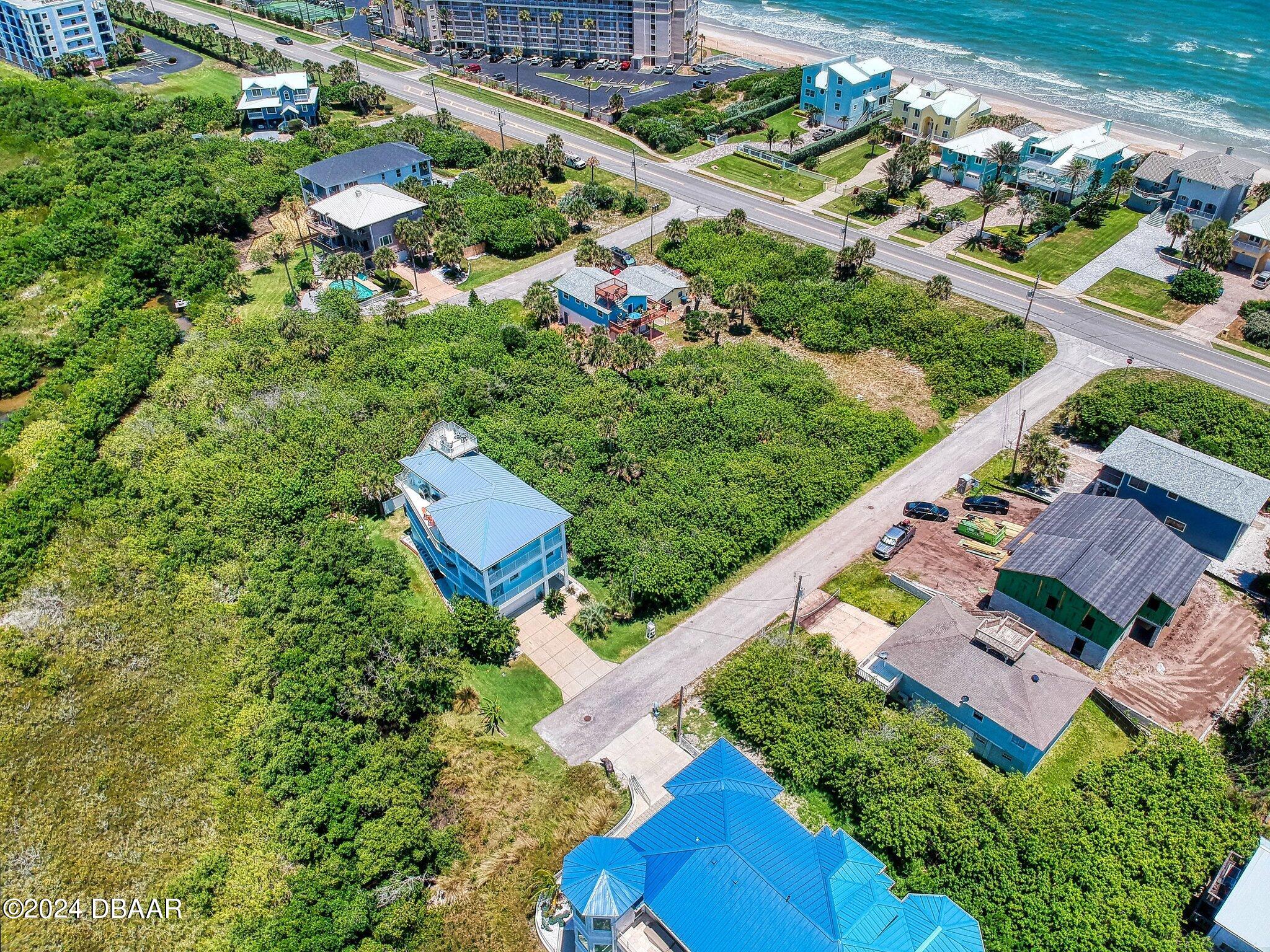 an aerial view of house with yard