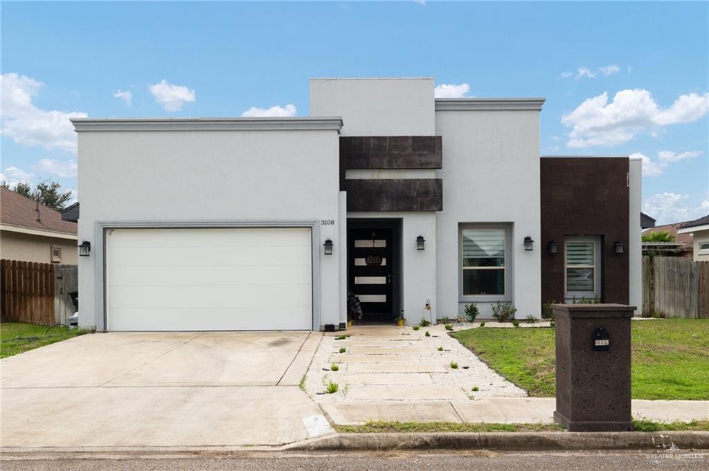 View of front facade with a garage