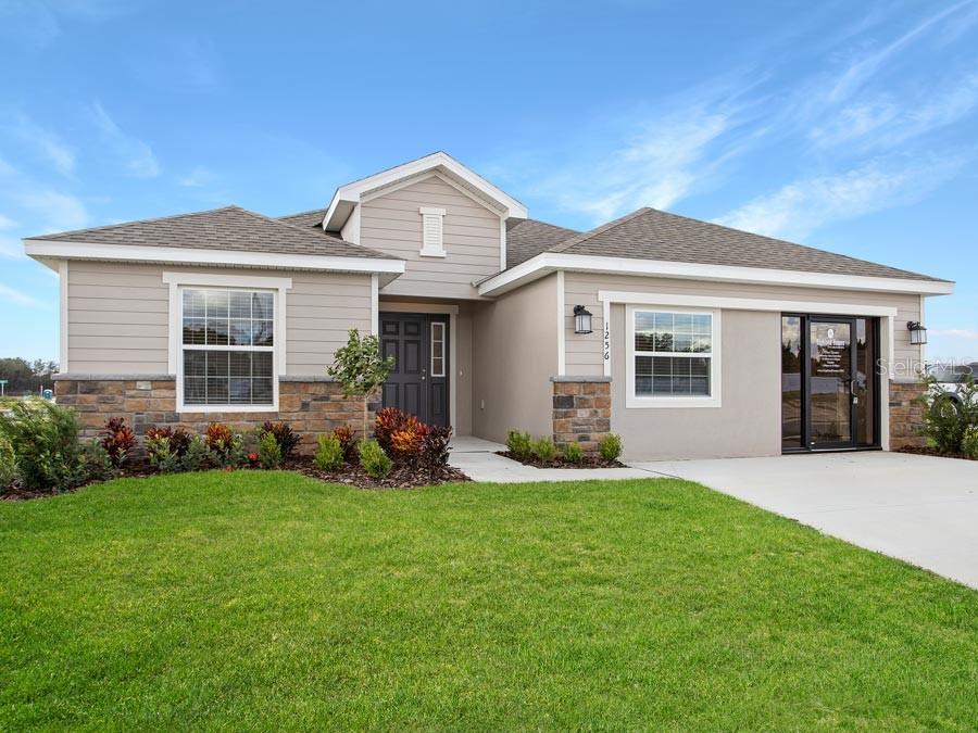 front view of a house and a yard