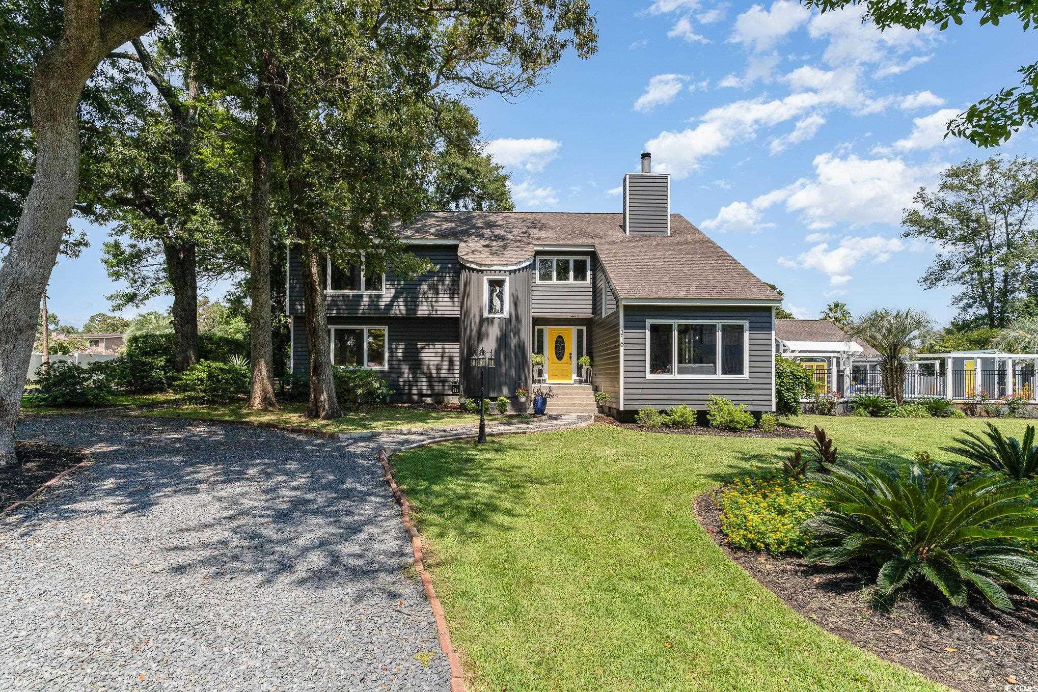 View of front of home with a front yard