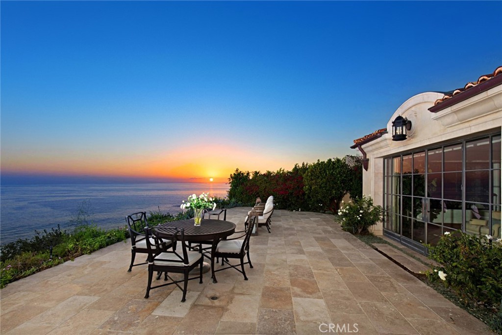 a view of a tables and chairs in patio