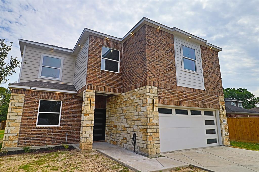 The exterior of this home features custom brick design to match stamped concrete driveway, 6ft wrought iron front fence w/sliding gate to match which is also pre-wire for a gate opener and 360 degree led soffit lighting w/ smart led color changing lights compatible with google assistant or amazon alexa.