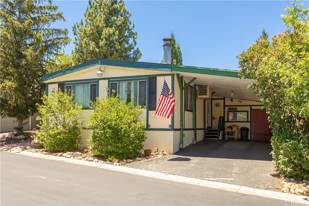 a front view of a house with a garage