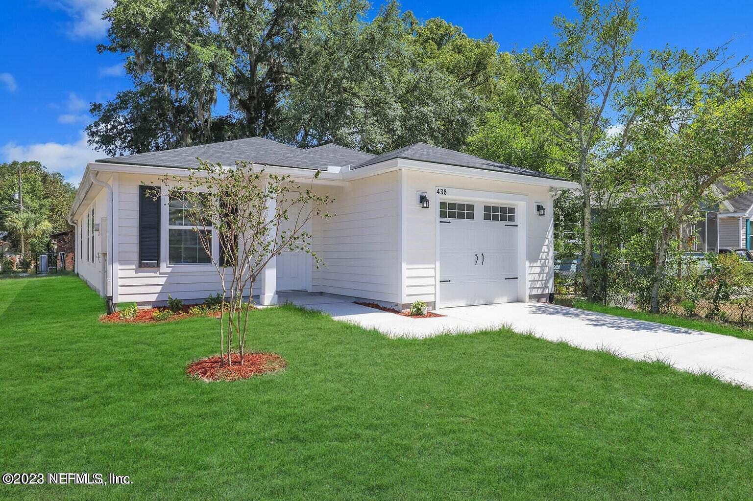 a view of a backyard with a garden