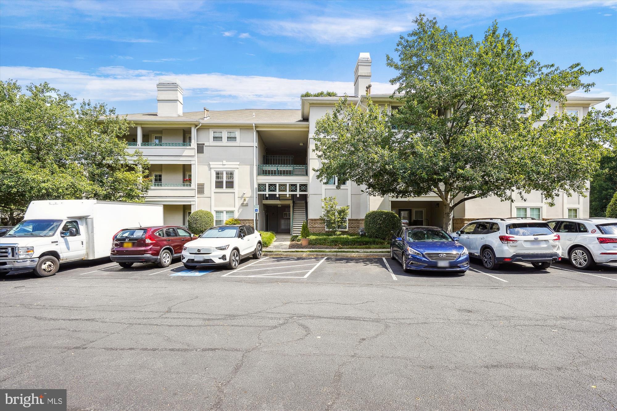 a view of a cars parked in garage