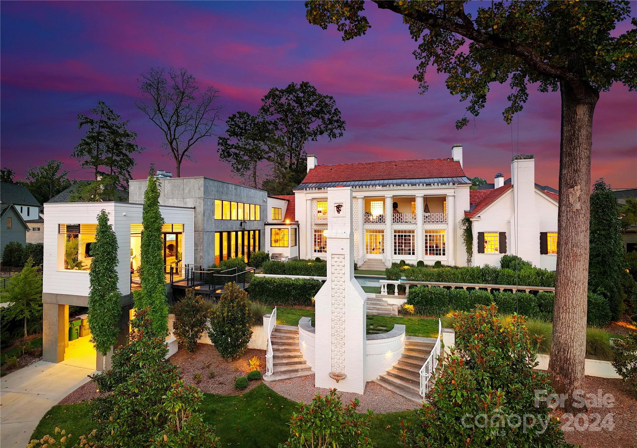 a front view of a house with a swimming pool