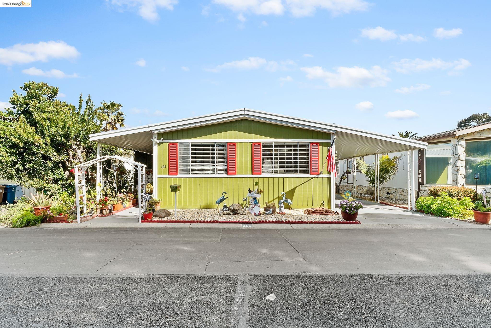 a front view of a house with a outdoor space