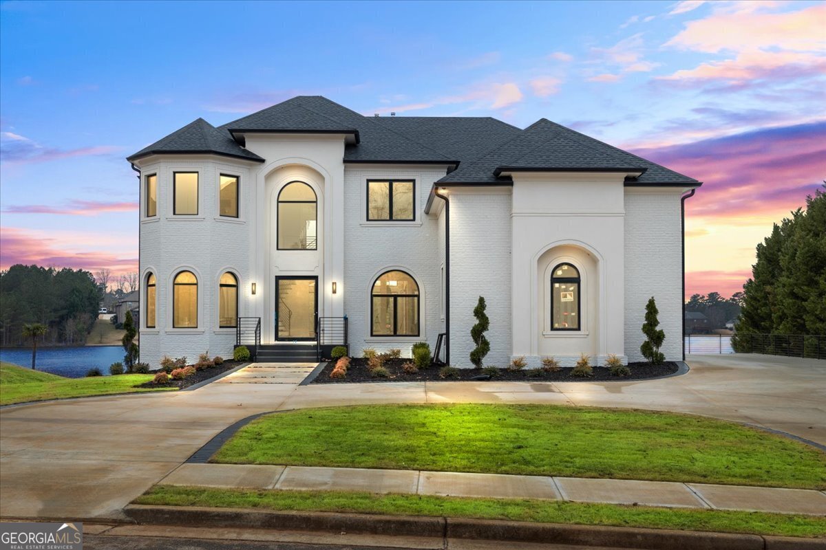 a front view of house with yard